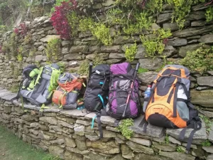 Trekking backpack carrying different gears to avoid trekking mistakes in Nepal