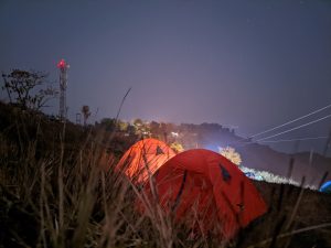 Setting up tents for Manungkot camping